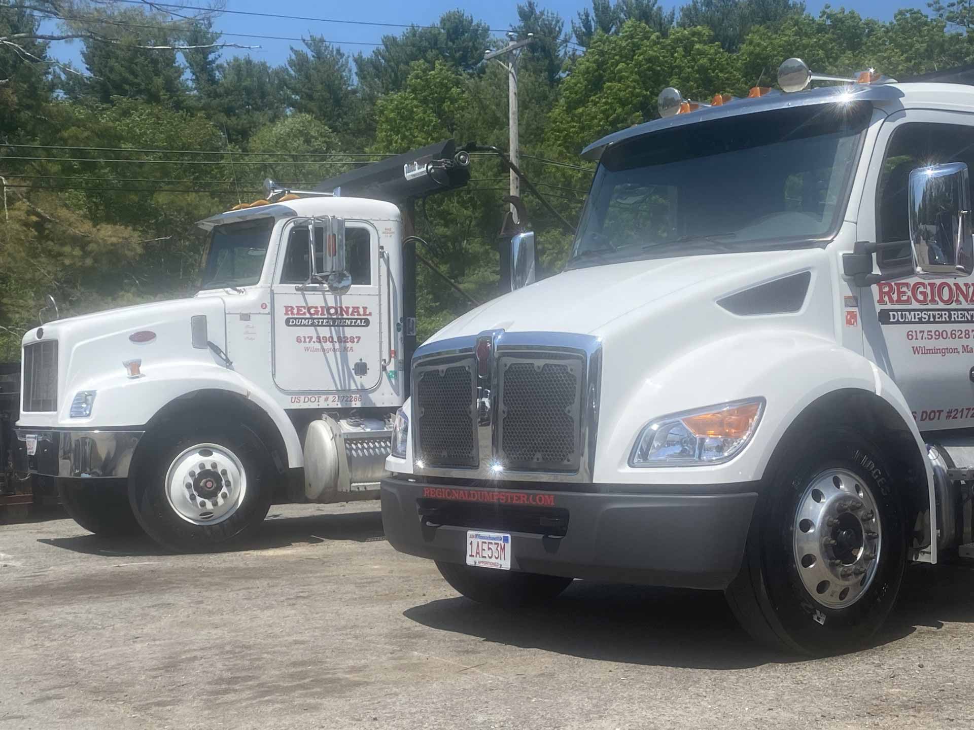 Two trucks from the Regional Dumpster Rental fleet